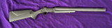 Fully suppressed Rossi 410 shotgun